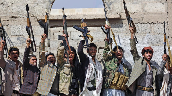 FILE - In this Dec. 15, 2015, file photo, Shiite tribesmen, known as Houthis, hold their weapons as they chant slogans during a tribal gathering showing support for the Houthi movement in Sanaa, Yemen. Saudi Arabia traded 109 Yemeni prisoners taken during its coalition war against Shiite rebels there for nine Saudis, authorities said Monday, March 27, 2016 the latest prisoner exchange ahead of a scheduled April cease-fire and peace talks. (AP Photo/Hani Mohammed, File)